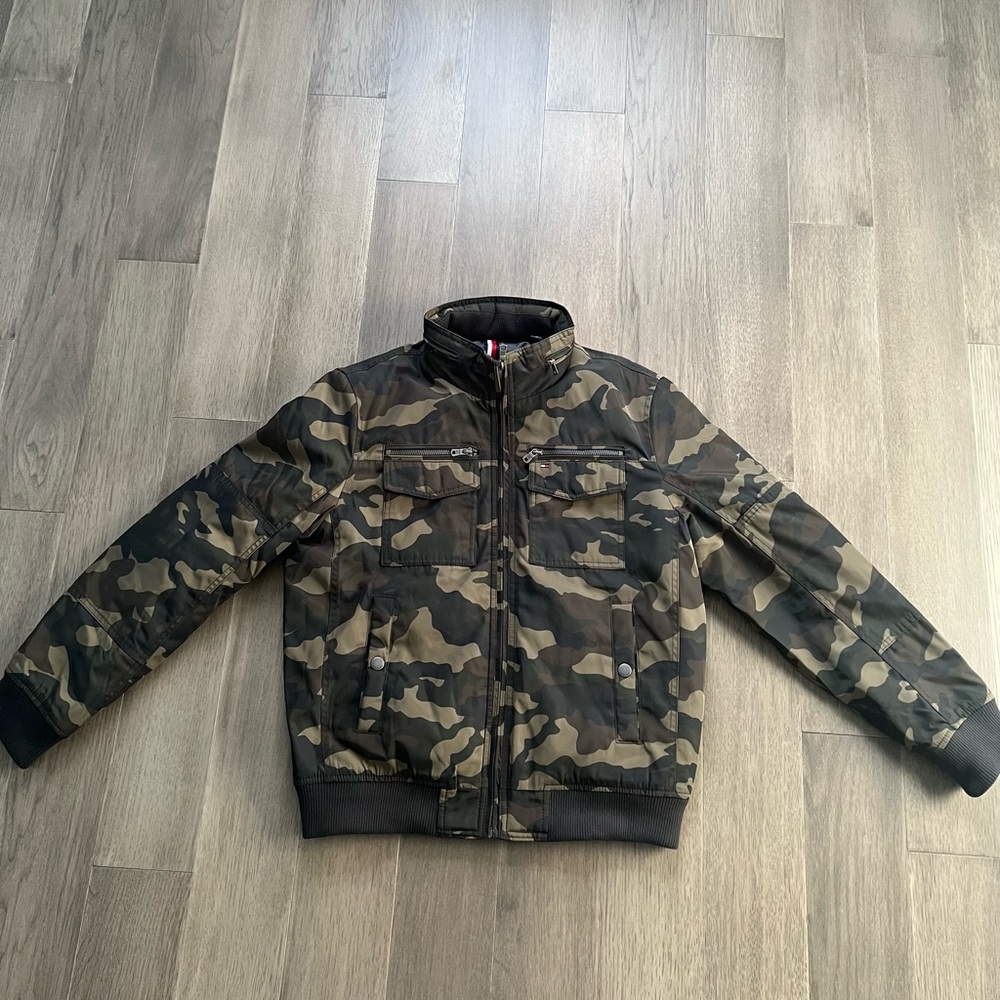 Mens Tommy Hilfiger camouflage four-pocket filled performance bomber jacket.